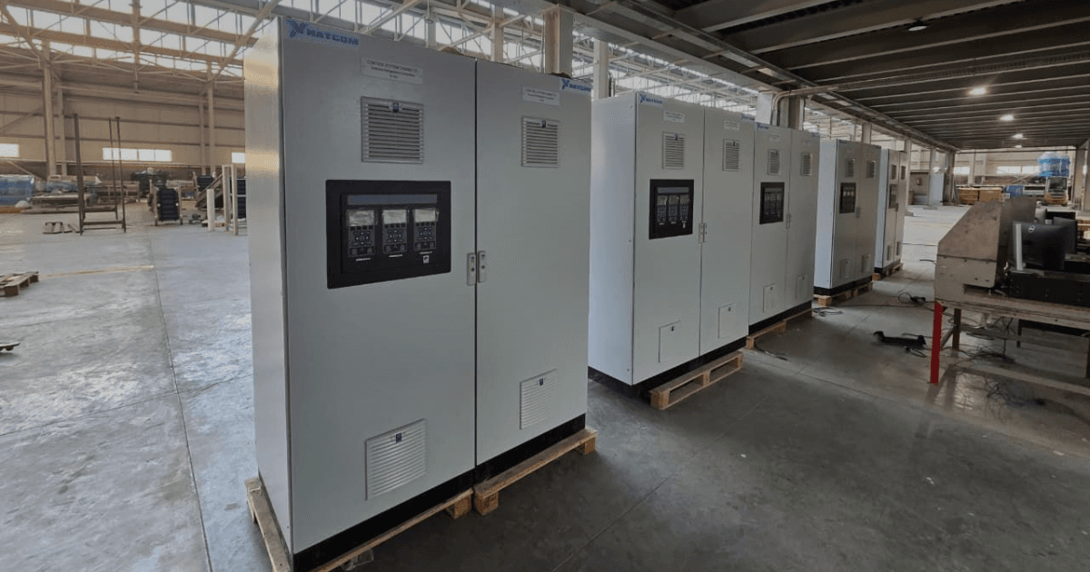 NATCOM-branded turbomachinery control panels staged for delivery to ASMEDA